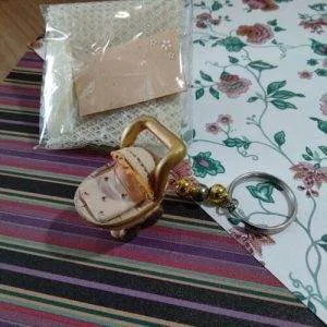 Bomboniere B1 BATTESIMO NASCITA Carrozzina ANTICATA Beige ORO Rete Nastrino Pois