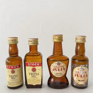 (cod:5)  LOTTO 4 BOTTIGLIETTE GRAPPA JULIA E TRIPLE SEC STOCK MIGNON RARE