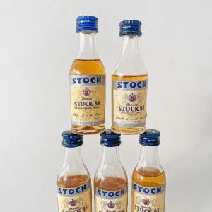 (cod:8)  LOTTO 5 BOTTIGLIETTE BRANDY STOCK 84 STOCK MIGNON