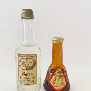 (cod:10)  LOTTO 2 BOTTIGLIETTE VECCHIA GRAPPA D'ITALIA E GRAPPA PIAVE MIGNON