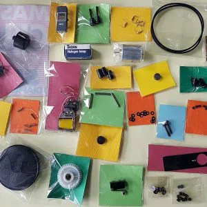 LOTTO STOCK (H)  SILMA EUMIG BAUER CINGHIE RICAMBI MINUTERIA RARO VINTAGE S8